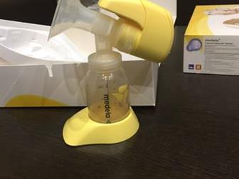    Medela mini ,   ,    ,   ,       ,   