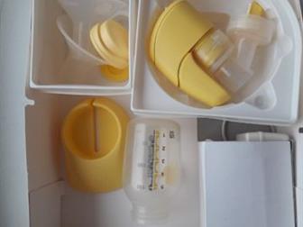  Medela Mini Electric     ,      ,        