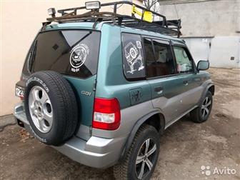 Mitsubishi Pajero io,     ,     (   ,   ,   ,     ,   